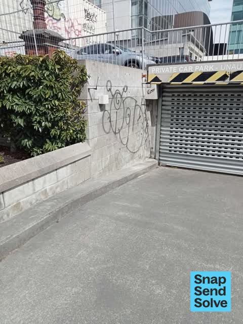 Graffiti on a fence, building or structure — a report photo
