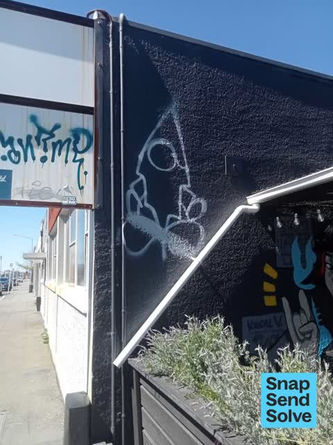Graffiti on a fence, building or structure, a report photo
