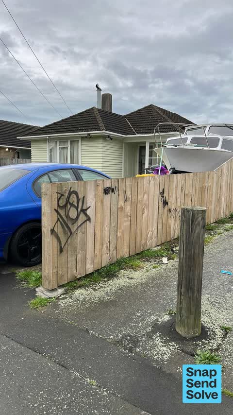 Graffiti on a fence, building or structure, a report photo