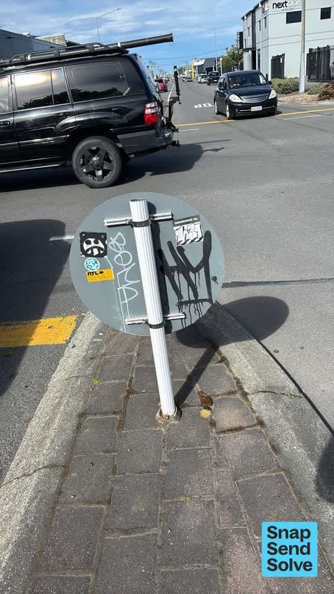 Graffiti on a sign, mural or public art, a report photo