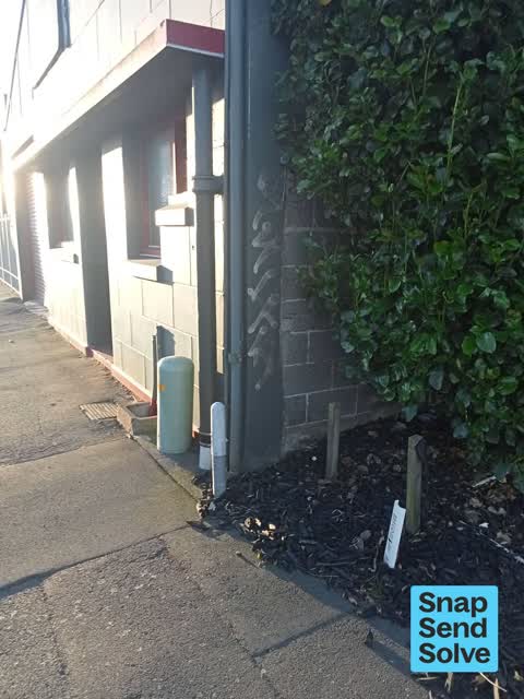 Graffiti on a fence, building or structure, a report photo