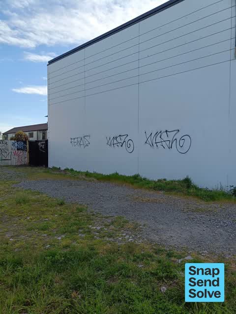 Graffiti on a fence, building or structure, a report photo