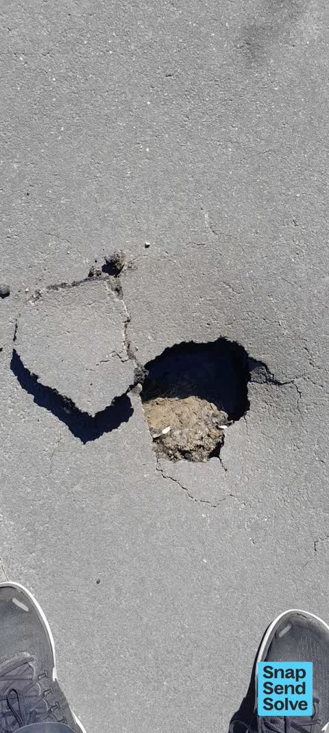 Pavement - Damaged, a report photo