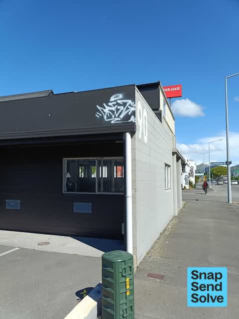 Graffiti on a fence, building or structure — a report photo