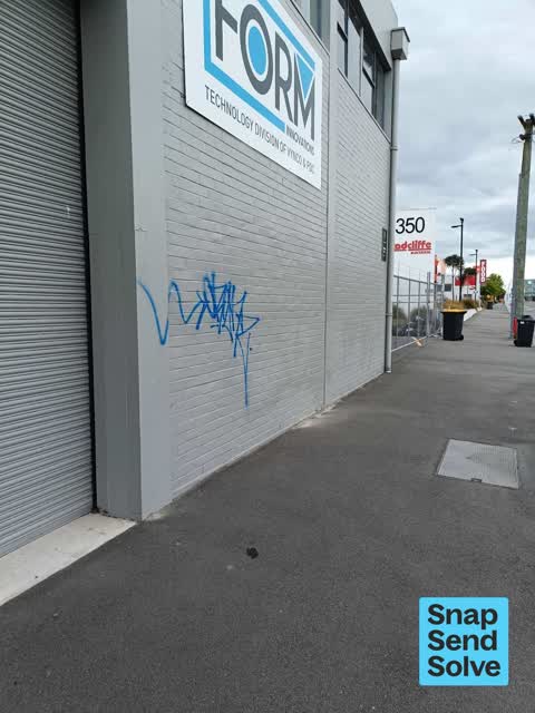 Graffiti on a fence, building or structure, a report photo