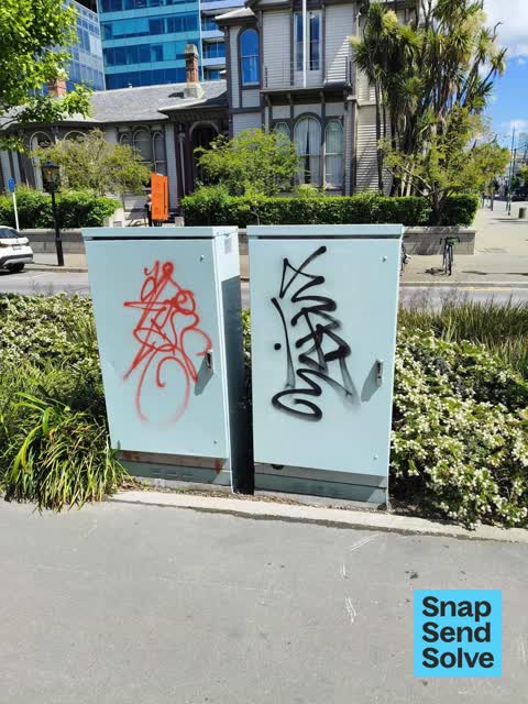 Graffiti on a traffic light pole or cabinet, or wa — a report photo