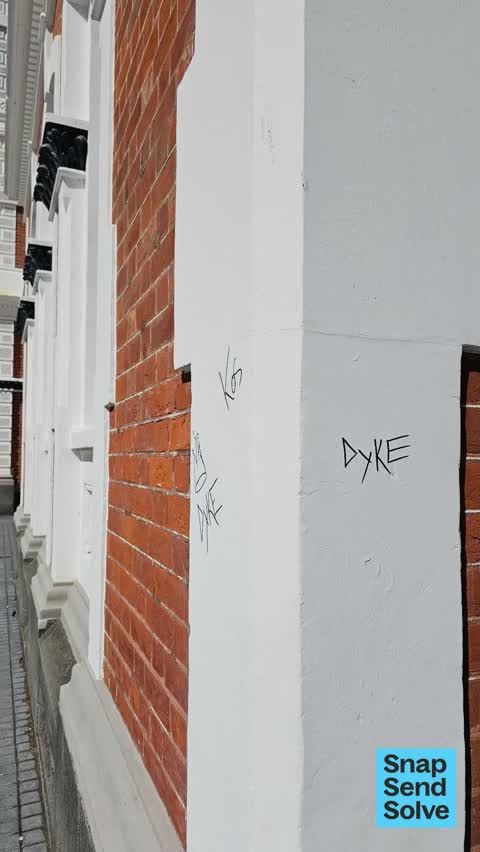 Graffiti on a fence, building or structure — a report photo