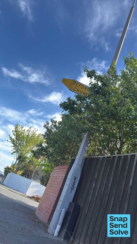 Graffiti on a traffic light pole or cabinet, or wa — a report photo