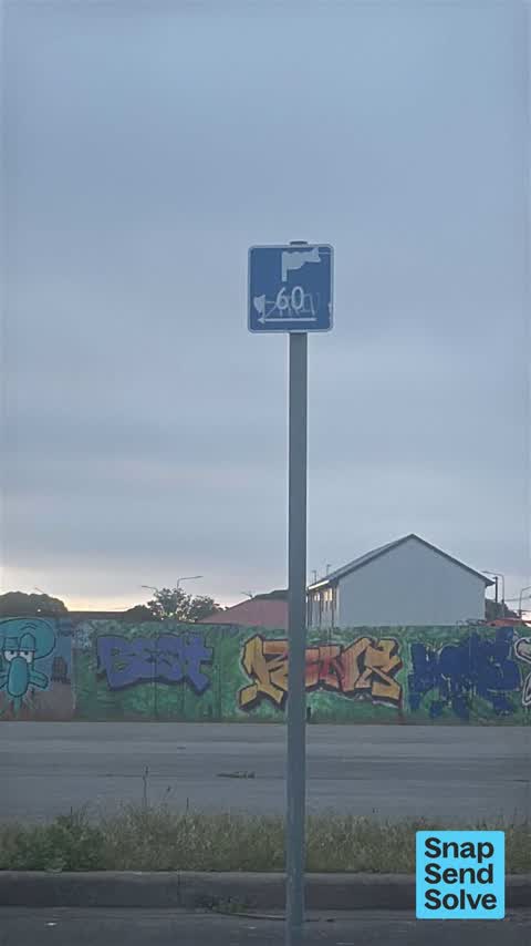 Graffiti on a sign, mural or public art, a report photo