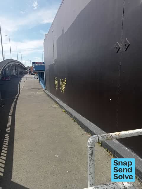 Graffiti on a fence, building or structure — a report photo