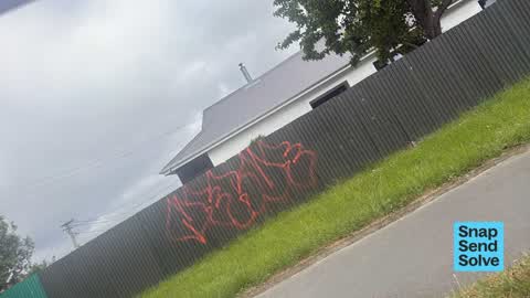 Graffiti on a fence, building or structure, a report photo