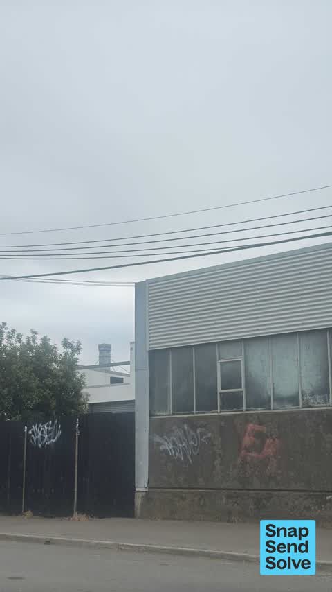 Graffiti on a fence, building or structure, a report photo