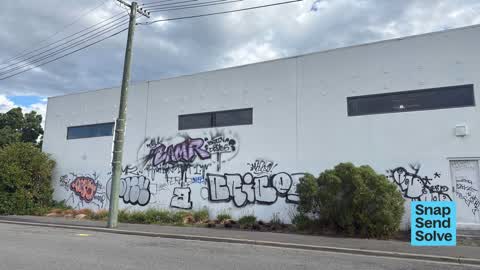 Graffiti on a fence, building or structure, a report photo
