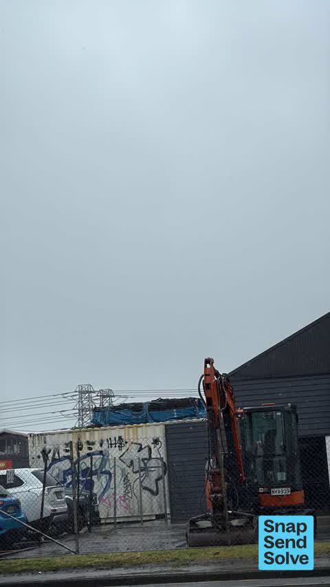 Graffiti on a fence, building or structure, a report photo