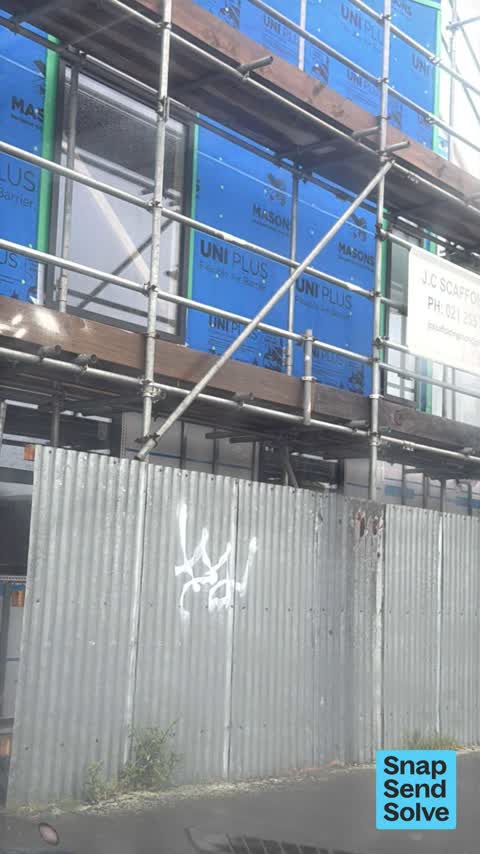 Graffiti on a fence, building or structure, a report photo