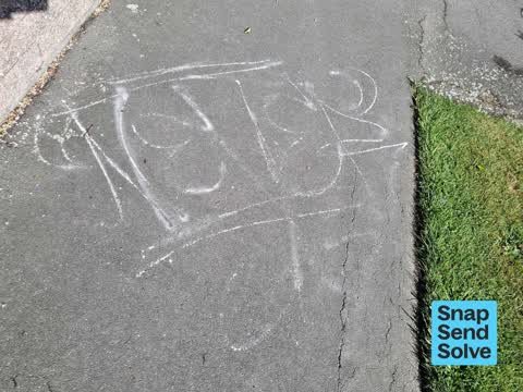 Graffiti on a road, footpath or bridge, a report photo