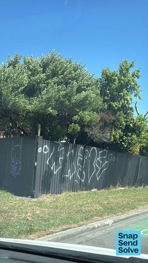 Graffiti on a fence, building or structure, a report photo