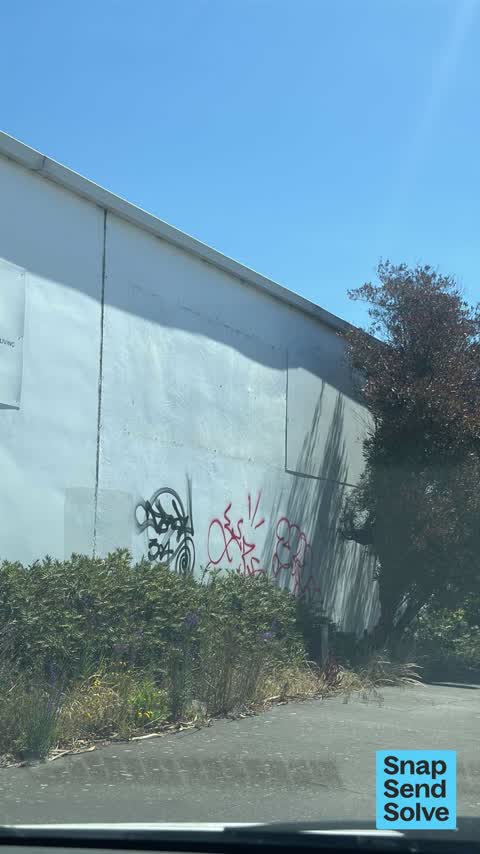 Graffiti on a fence, building or structure, a report photo