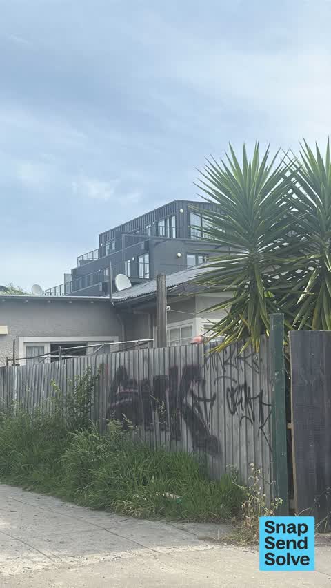 Graffiti on a fence, building or structure, a report photo