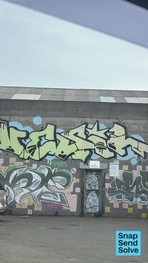 Graffiti on a fence, building or structure — a report photo