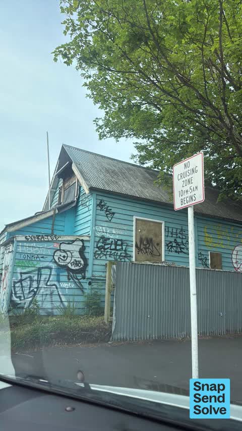 Graffiti on a fence, building or structure — a report photo
