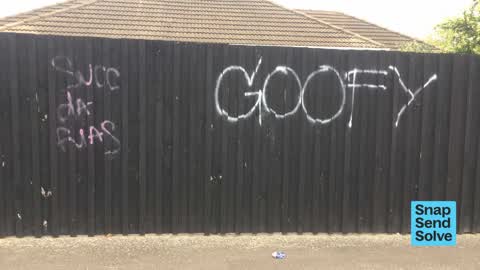 Graffiti on a fence, building or structure, a report photo