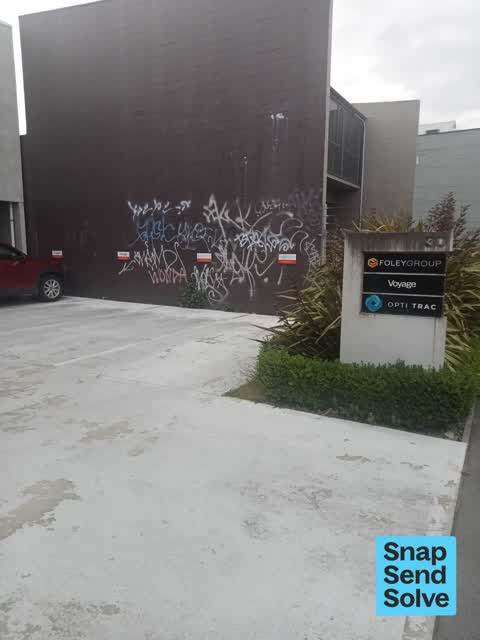 Graffiti on a fence, building or structure, a report photo