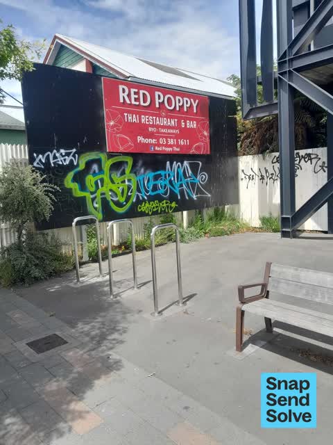 Graffiti on a fence, building or structure, a report photo