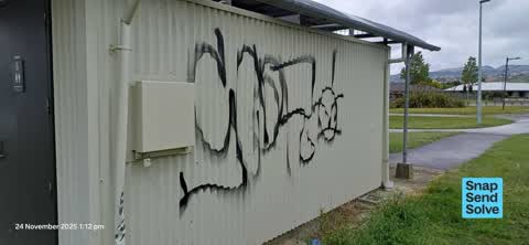 Graffiti on a bus stop or public toilet, a report photo