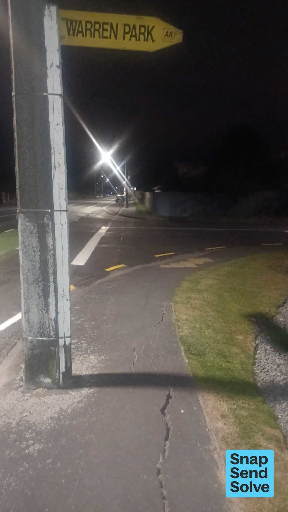 The photograph attached to this pavement - damaged report