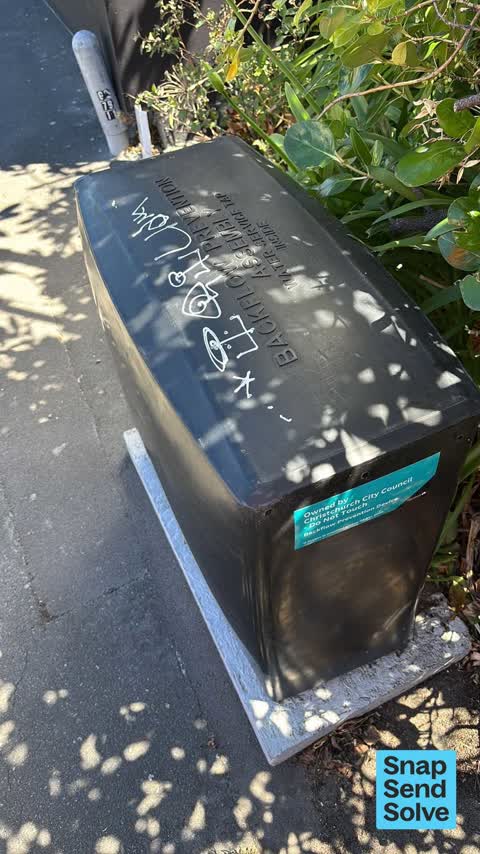 Graffiti on a traffic light pole or cabinet, or wa, a report photo