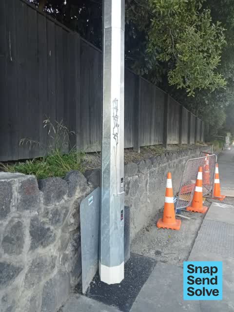 Graffiti on a fence, building or structure — a report photo