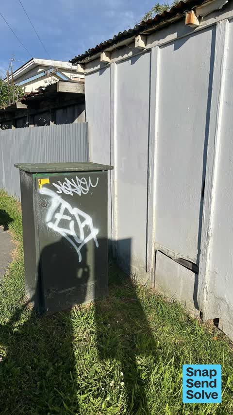 Graffiti on a fence, building or structure — a report photo