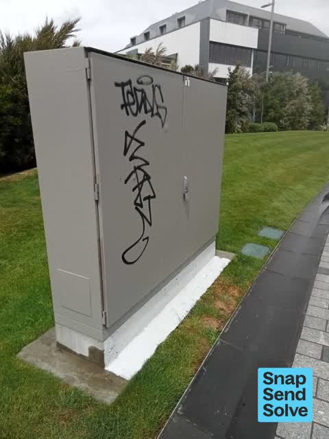 Graffiti on a fence, building or structure — a report photo