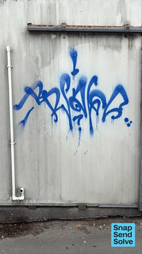 Graffiti on a fence, building or structure, a report photo