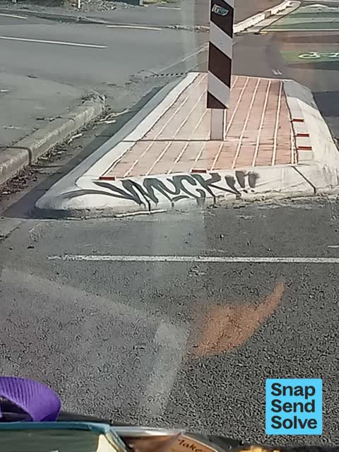 Graffiti on a road, footpath or bridge — a report photo