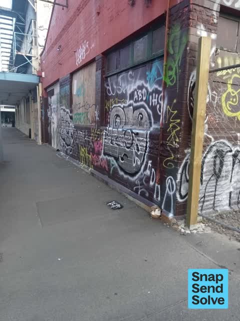 Graffiti on a fence, building or structure — a report photo