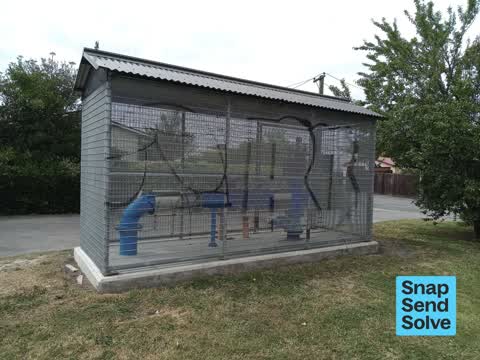 Graffiti on a traffic light pole or cabinet, or wa — a report photo