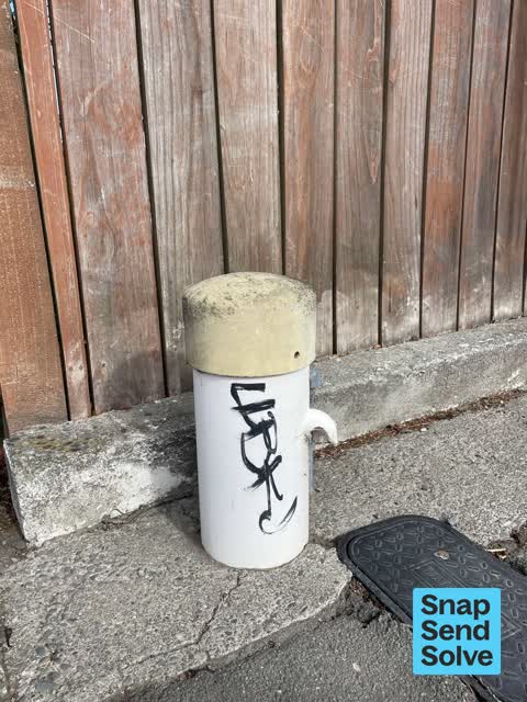 Graffiti on a fence, building or structure, a report photo