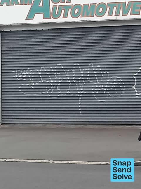 Graffiti on a fence, building or structure, a report photo