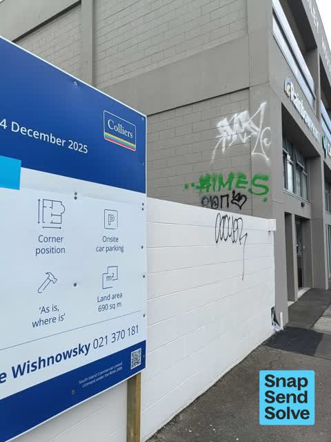 Graffiti on a fence, building or structure — a report photo