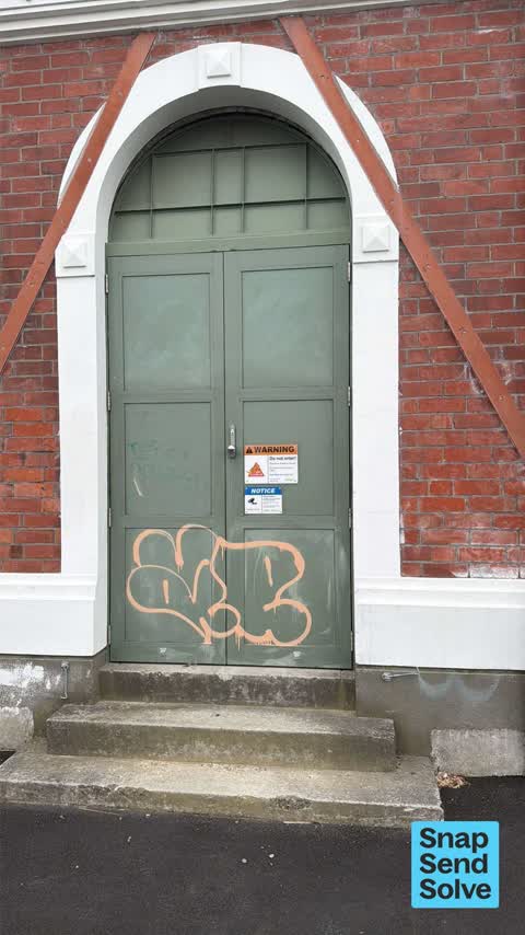 Graffiti on a fence, building or structure, a report photo