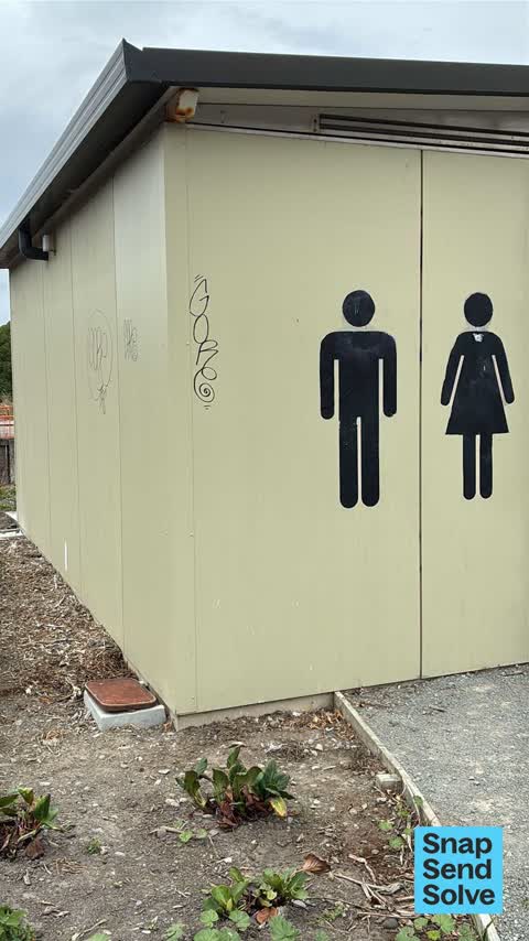 Graffiti on a bus stop or public toilet, a report photo