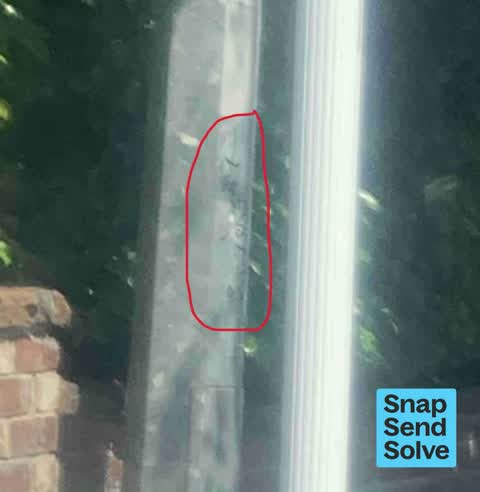 Graffiti on a traffic light pole or cabinet, or wa, a report photo