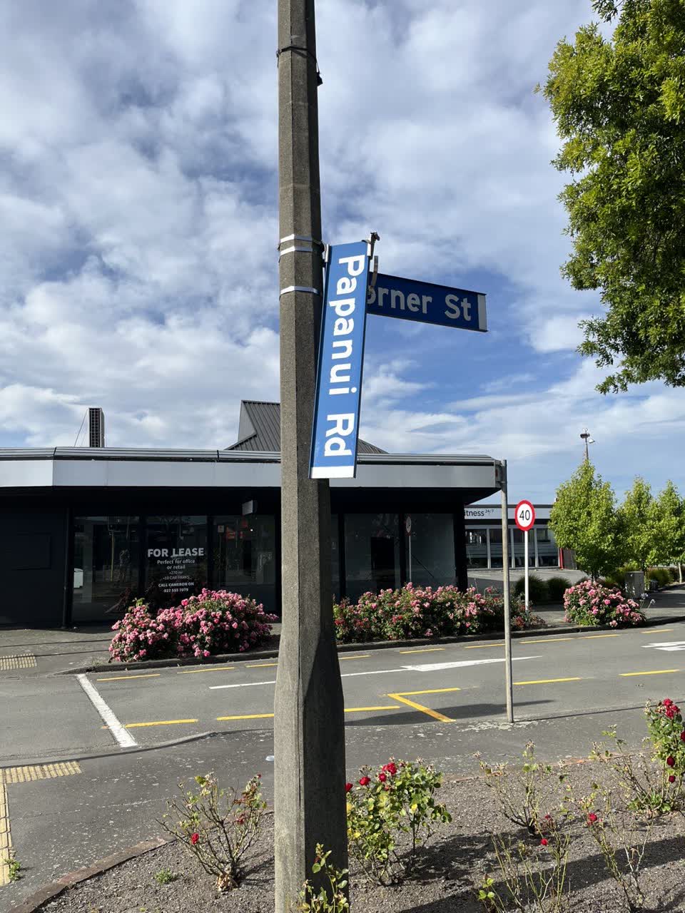 The photograph attached to this damaged street sign report