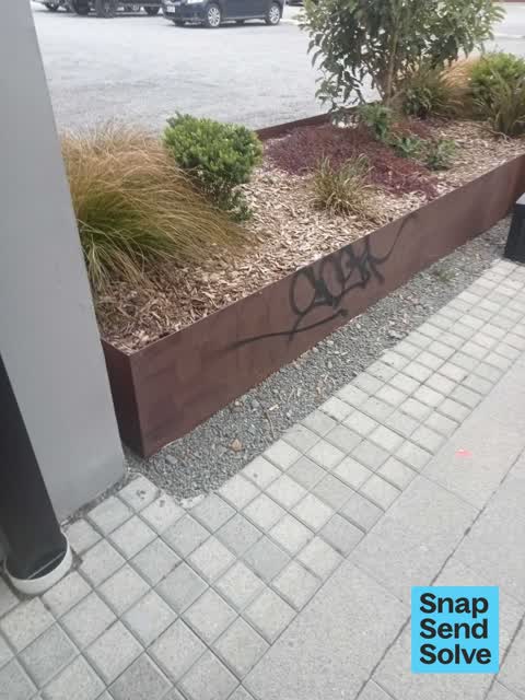 Graffiti on a fence, building or structure — a report photo