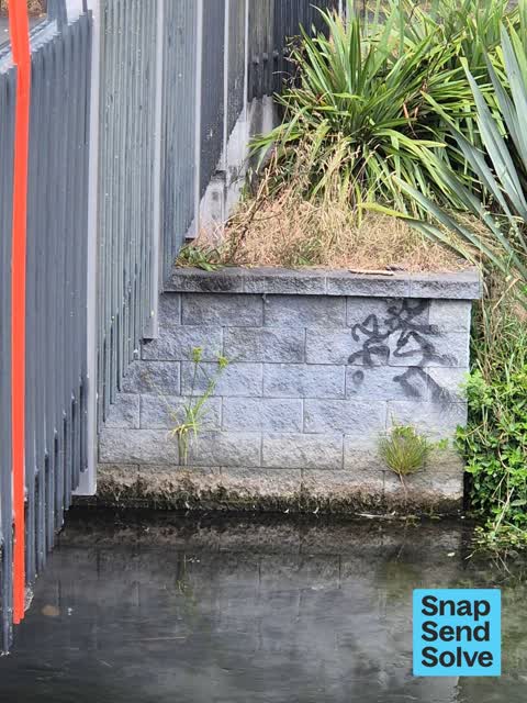 Graffiti on a road, footpath or bridge — a report photo
