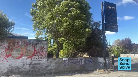 Graffiti on a fence, building or structure — a report photo