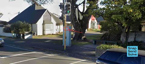 Graffiti on a traffic light pole or cabinet, or wa — a report photo