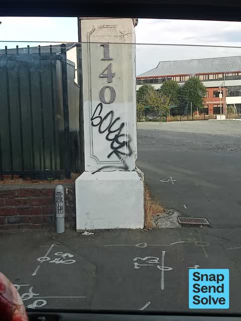 Graffiti on a fence, building or structure, a report photo